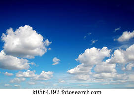 Blue sky with cotton like clouds
