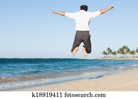 man springend, op, strand