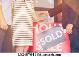 People taking keys of house