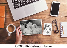 Desktop mix on a wooden office table.