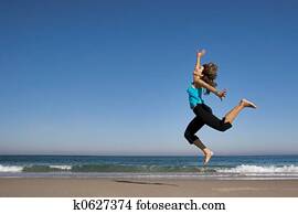 Jumping on the beach