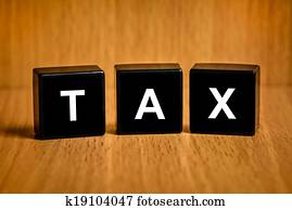 Tax accounting text on block Tax accounting text on block