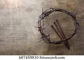Jesus Crown Thorns and nails on Old and Grunge Wood Background. Vintage Retro Style. Free space for text