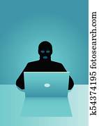 Hacker behind laptop computer Hacker behind laptop computer