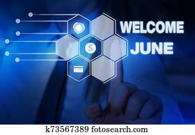 Word writing text Welcome June. Business concept for Calendar Sixth Month Second Quarter Thirty days Greetings Woman wear formal work suit presenting presentation using smart device. Word writing text Welcome June. Business concept for Calendar Sixth Month Second Quarter Thirty days Greetings Woman wear formal work suit presenting presentation using smart device.