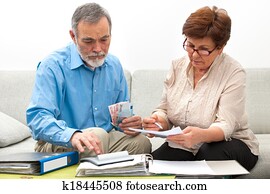 couple calculating home finances