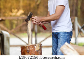 man chopping wood