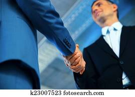 Closeup of a business handshake Closeup of a business handshake