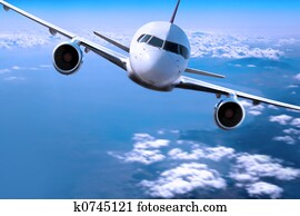 Airplane above the clouds,