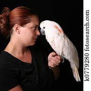 Caucasian Woman Holding Her Pet Moluccan Cockatoo