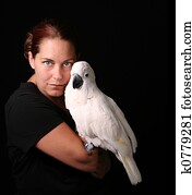 Caucasian Woman Holding Her Pet Moluccan Cockatoo