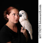 Caucasian Woman Holding Her Pet Moluccan Cockatoo