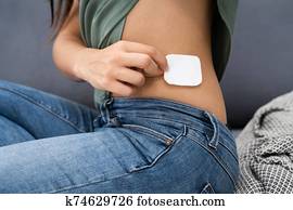 applying nicotine patch