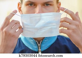 masked man from coronavirus and air. Protection against PM 2.5 air polluted from thea virus in Europe and Asia masked man from coronavirus and air. Protection against PM 2.5 air polluted from thea virus in Europe and Asia