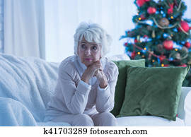 Senior woman sitting alone Senior woman sitting alone