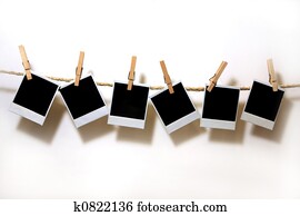 Hanging Vintage Polaroid Papers  on White