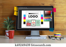 Creative Designer Graphic at work. Color swatch samples, Illustrator Graphic designer working digital tablet and computer Creative Designer Graphic at work. Color swatch samples, Illustrator Graphic designer working digital tablet and computer