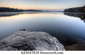 Lake in Autumn sunrise reflection
