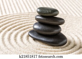 Japanese zen garden with black pebbles