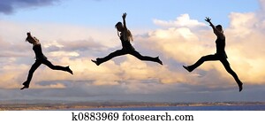 Leaping woman at sunset Leaping woman at sunset