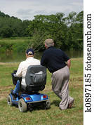 Rear View of Friends Standing on Stone Wall Stock Image | k2839750