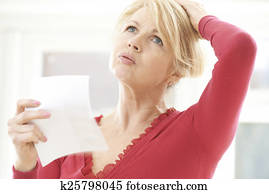 Mature Woman Experiencing Hot Flush From Menopause Mature Woman Experiencing Hot Flush From Menopause