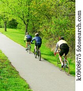Bicycling in a park Bicycling in a park
