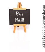 Buy Me. Blackboard with text and easel. 