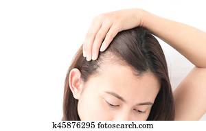 Woman serious hair loss problem for health care shampoo and beauty product concept Woman serious hair loss problem for health care shampoo and beauty product concept