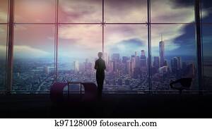 A businesswoman looks through the panoramic window at the cityscape, 3D render.