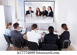 Group Of Businesspeople In Video Conference