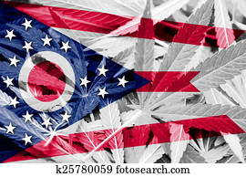 Ohio State Flag on cannabis background. Drug policy. Legalization of marijuana Ohio State Flag on cannabis background. Drug policy. Legalization of marijuana