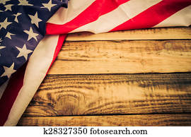 American flag on wooden background