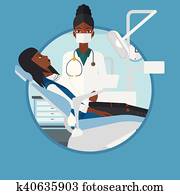 Patient and doctor at dentist office.