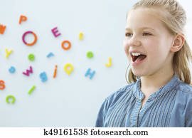Girl in speech therapy office