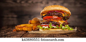 Home made hamburger with lettuce and cheese Home made hamburger with lettuce and cheese