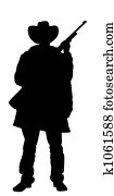 Cowboy holding rifle Cowboy holding rifle