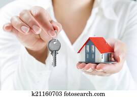 real estate agent handing over keys