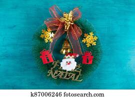 Christmas decoration with christmas wreath. Blue background. Christmas decoration with christmas wreath. Blue background.