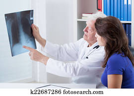Doctor analyzing x-ray