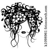 Beautiful woman with flowers in hair