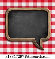 menu chalkboard speech bubble on table with picnic tablecloth menu chalkboard speech bubble on table with picnic tablecloth