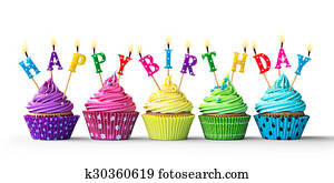 Colorful birthday cupcakes on white