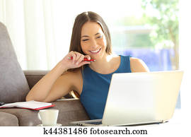 Entrepreneur working at home with a laptop Entrepreneur working at home with a laptop