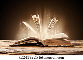 Old book on wooden table