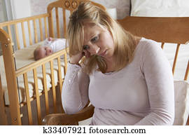 Mother In Nursery Suffering From Post Natal Depression Mother In Nursery Suffering From Post Natal Depression