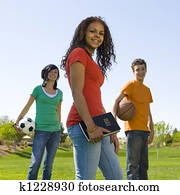 Three teens with bible Three teens with bible