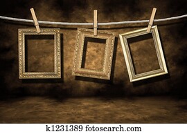 Gold Photo Frames on a Distressed Grunge Background Gold Photo Frames on a Distressed Grunge Background