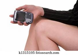 Hand holding a cell phone