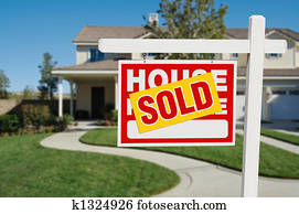 Sold Home for Sale Real Estate Sign and House
